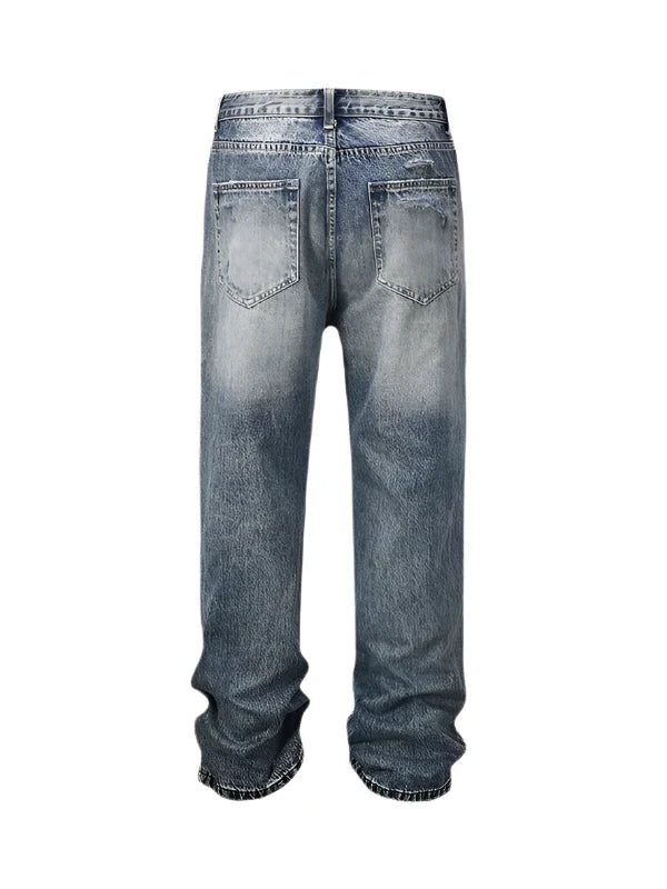 Jeans With Ripped Design