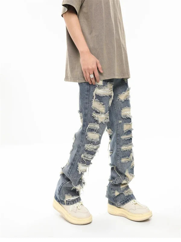 Jeans With Ripped Design