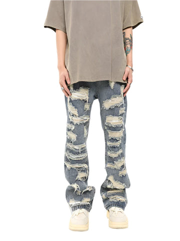 Jeans With Ripped Design